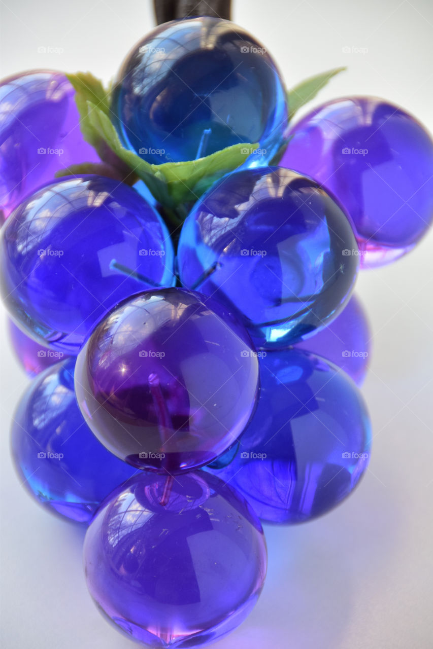 Symmetry: violet and blue glass spheres