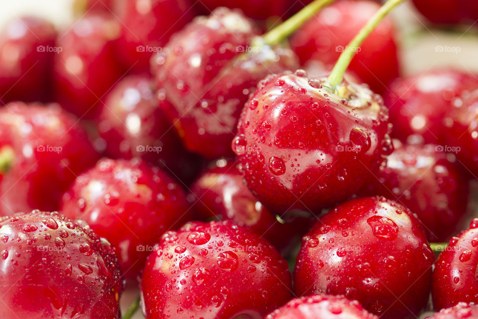 summer berries background.  wet cherries close up