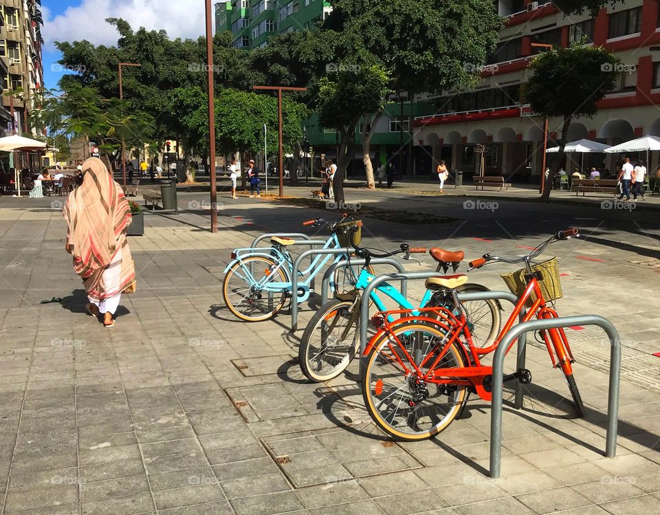 colorful bicycles parked in a square in Gran Canaria, Spain