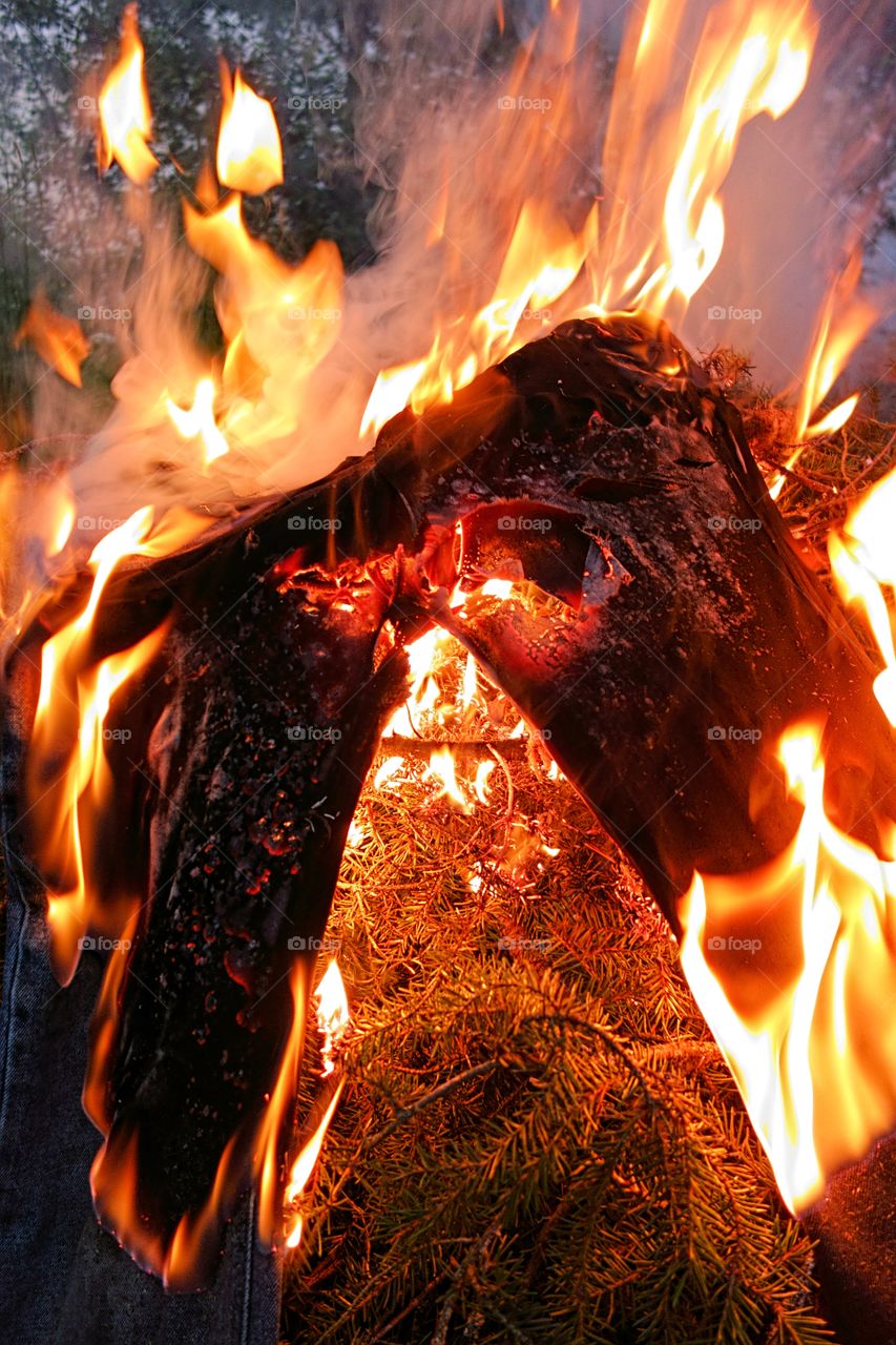 Jeans on fire. 
Jeans on fire on top of the midsummer bonfire