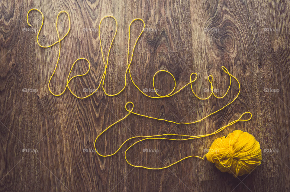 Yellow treads laying on a floor