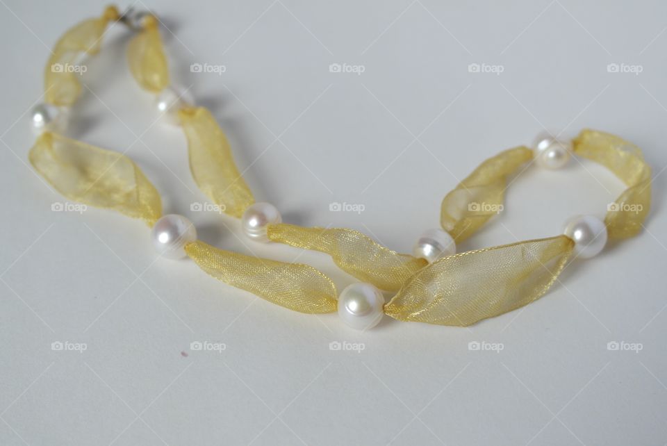Gold ribbon and white freshwater pearl necklace 