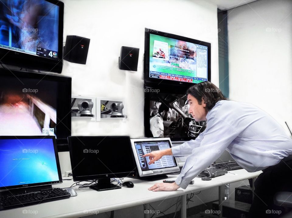 Using a Touch Panel to route video signals throughout the building at work