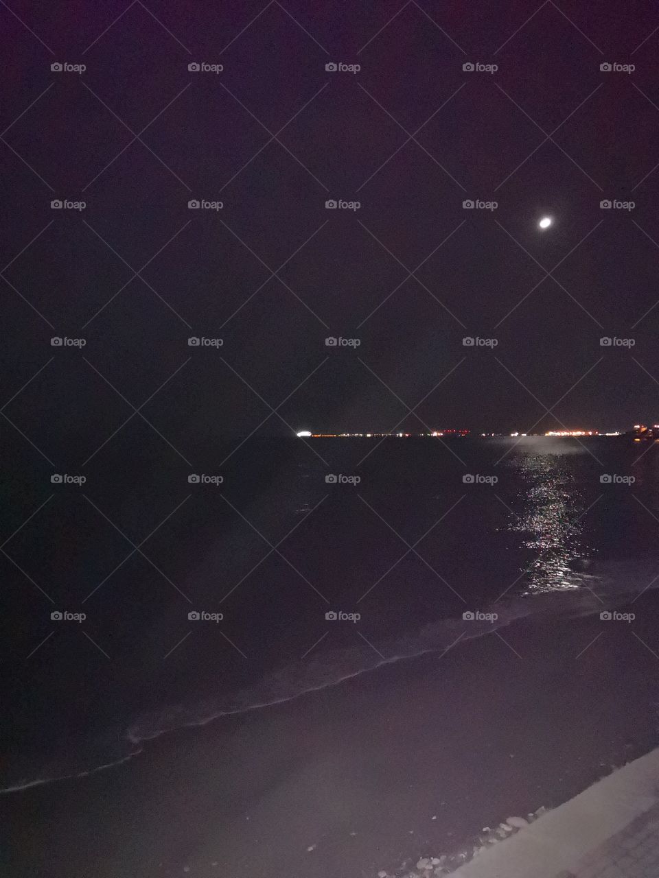 Moon by the sea