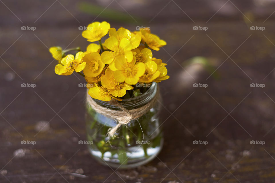 Yellow flowers and vase 