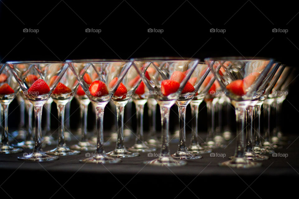 Abstract - image of glasses and strawberries arranged to create an abstract image