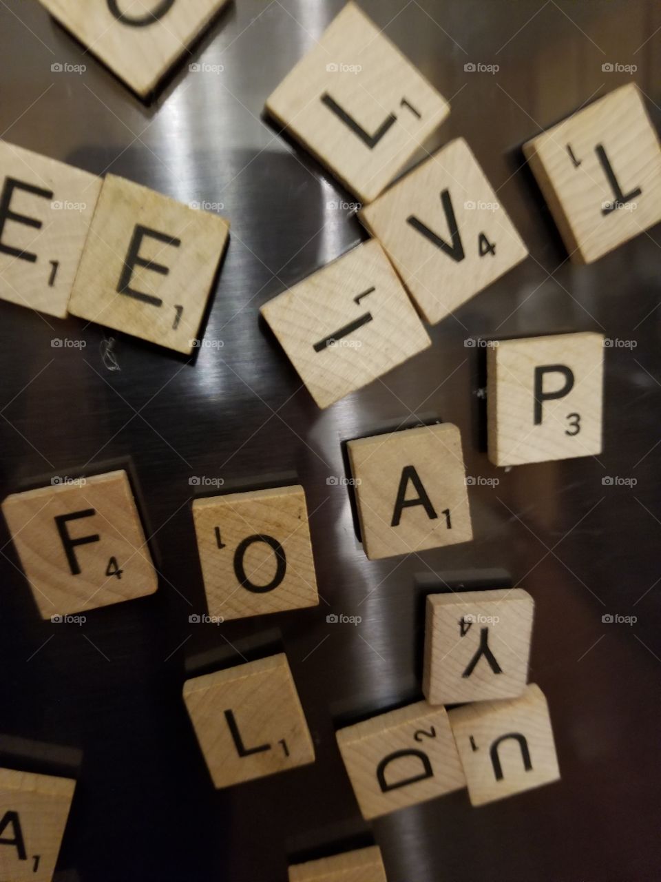 letter pieces on fridge door FOAP