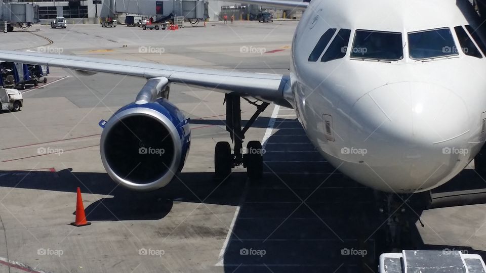 Airplane parked at gate