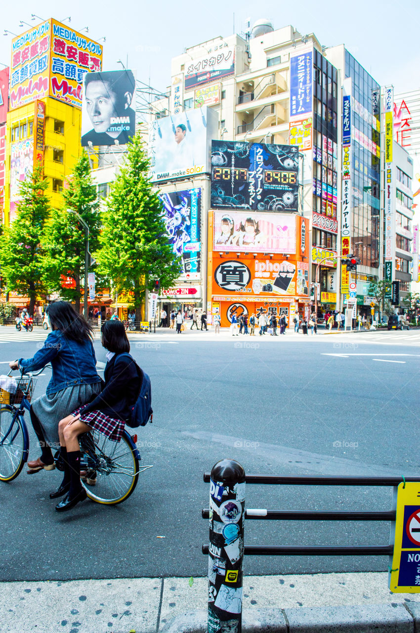 Two girls on a Bike in Tokyo