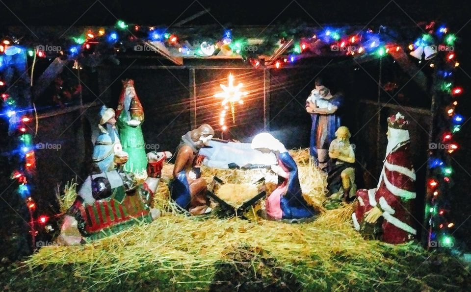 A nativity set without the baby Jesus-someone stole the doll last year