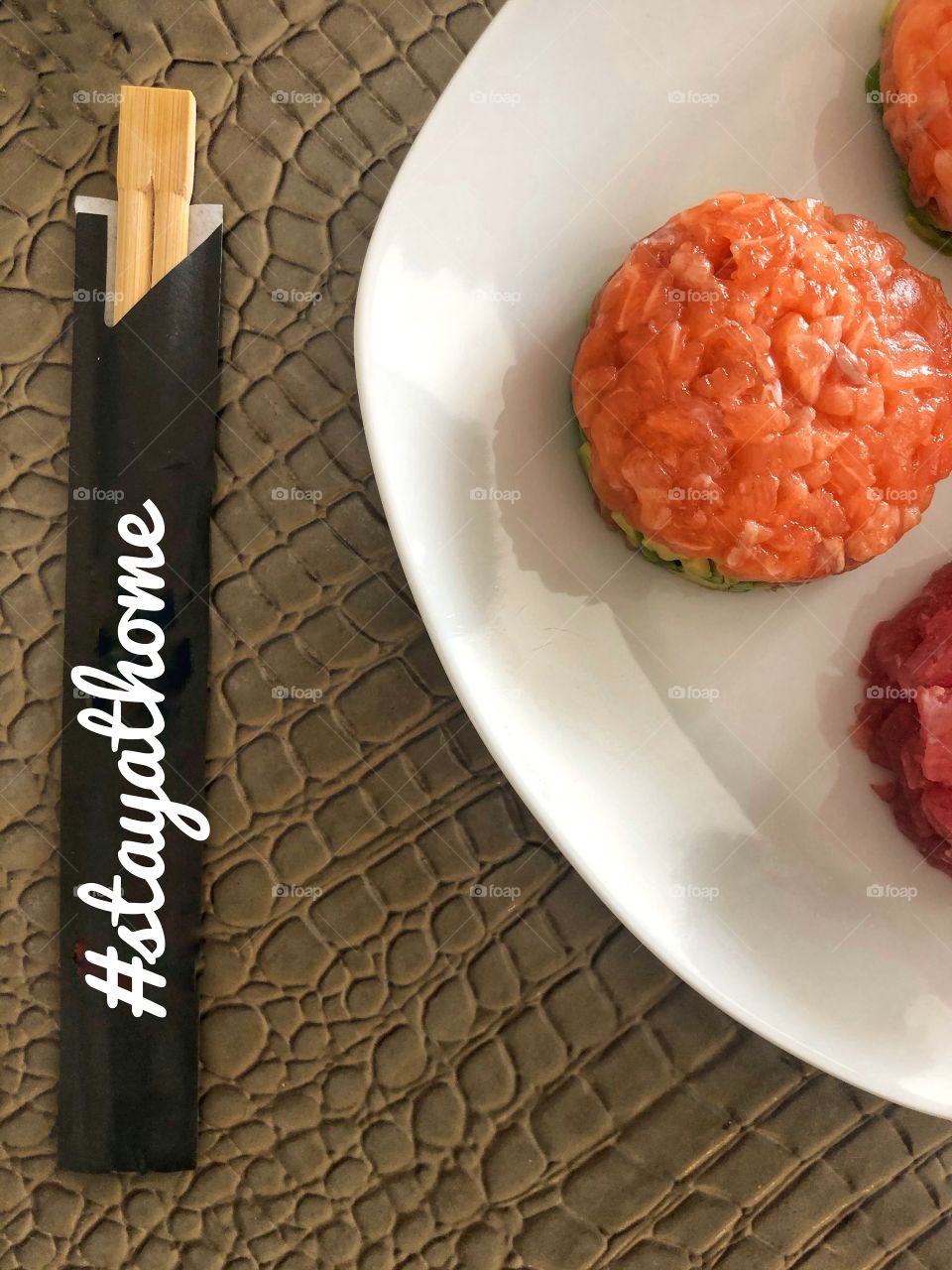 homemade salmon tartare and Japanese chopsticks, quarantine in the time of Coronavirus