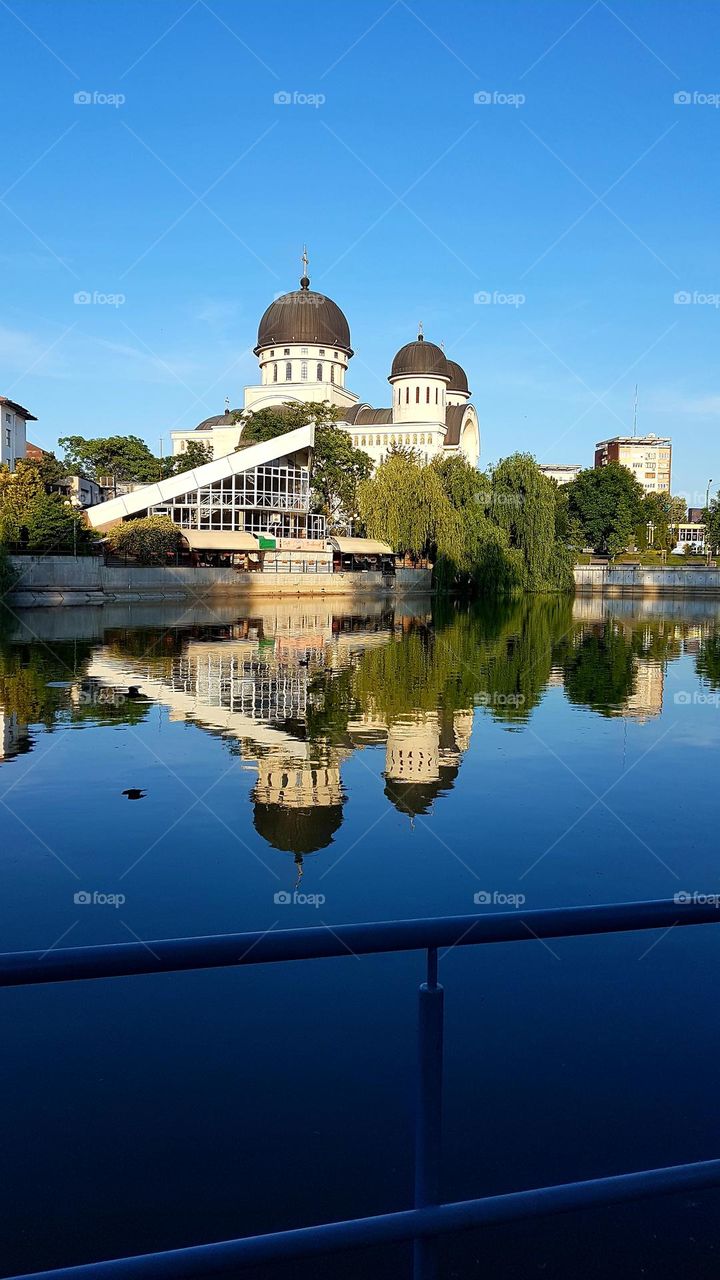 the reflection of the church in the lake