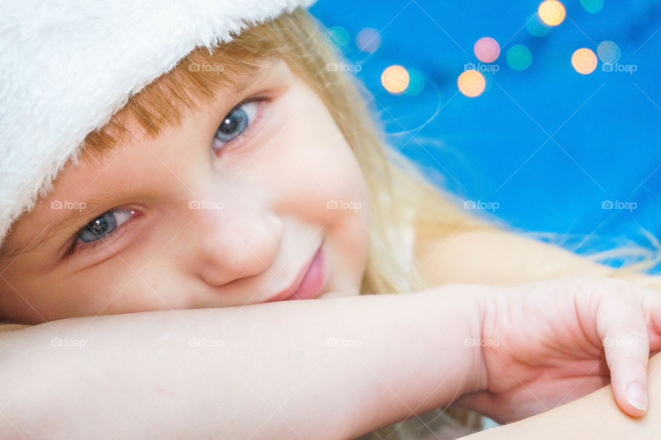 pretty little girl in Santa hat