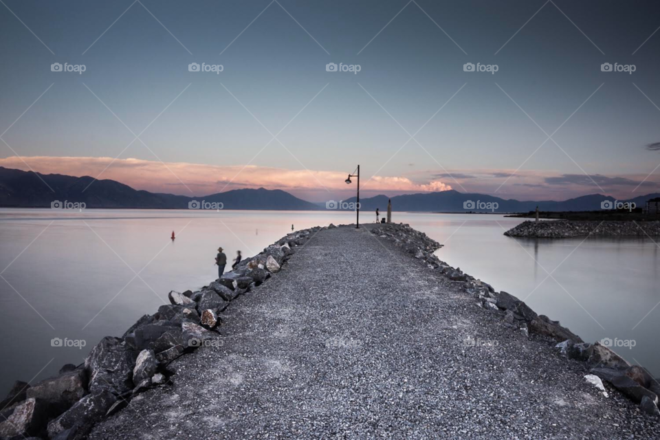 Sunset landscape photo with a walkout pier into Utah Lake