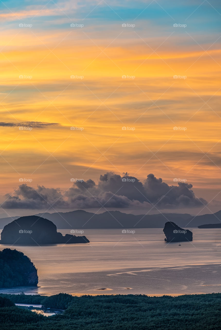 Golden time of sunrise above beauty sea scape