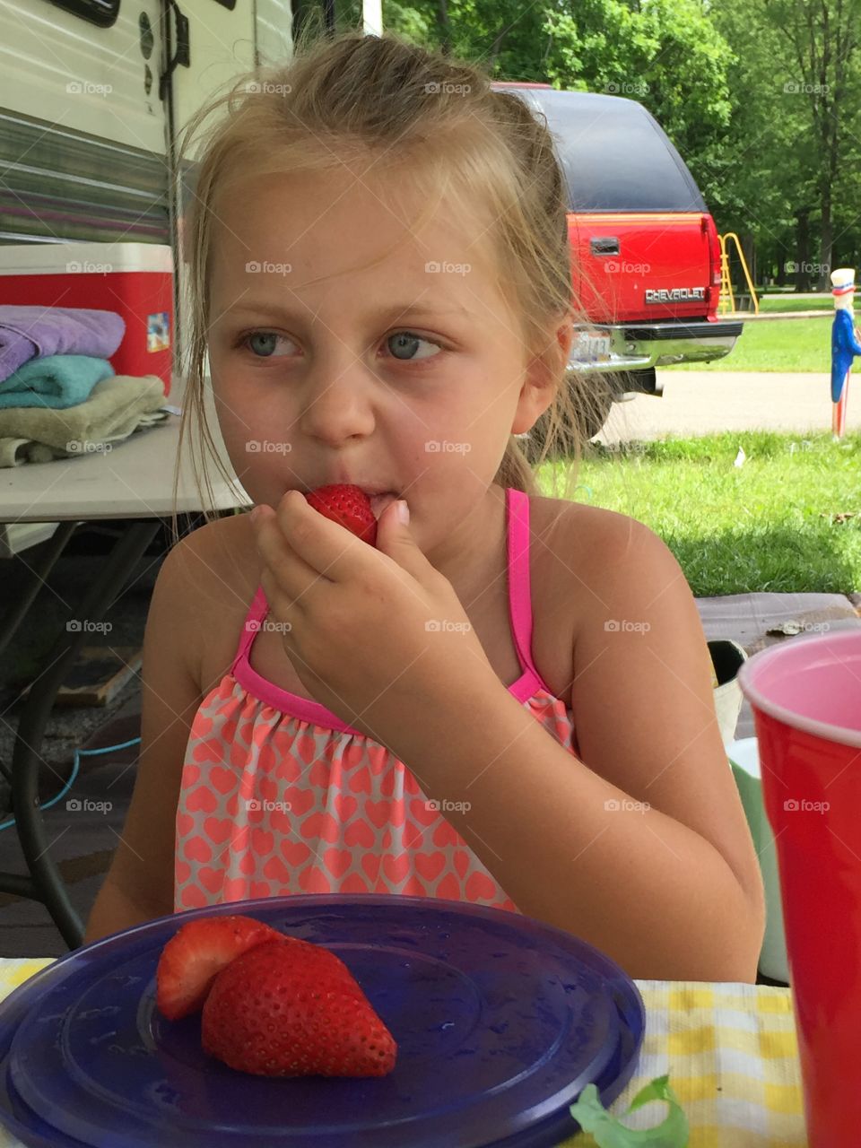 Eating a strawberry