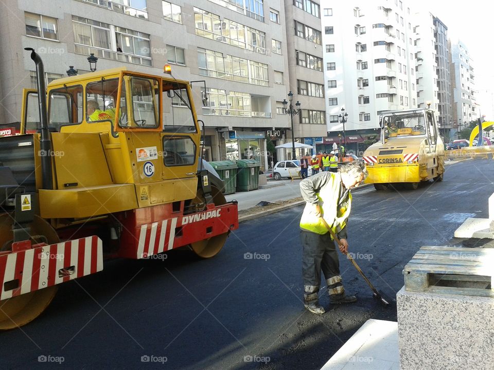New street. Workers and machines making a street