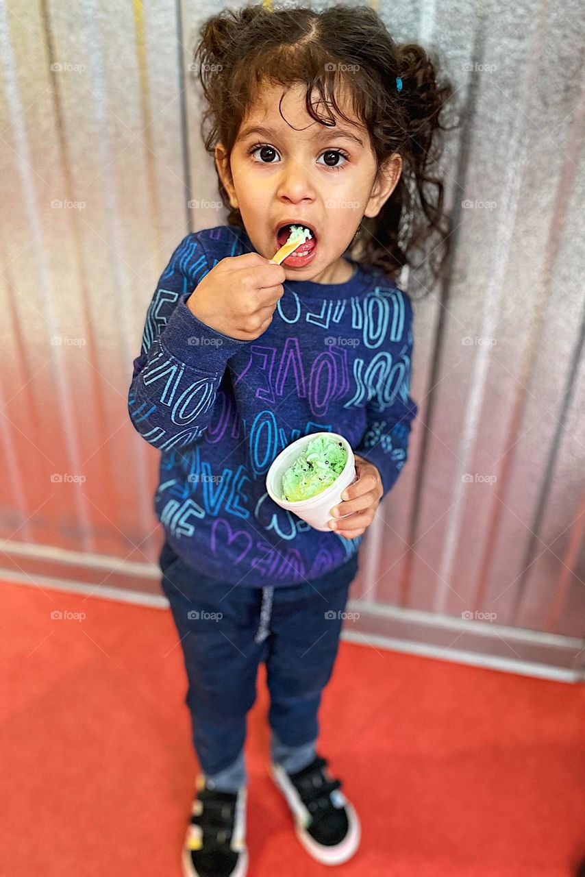 Toddler girl loves ice cream, toddler excited about ice cream, facial expressions on toddlers, eating ice cream at the Turkey Hill factory, Pennsylvania Ice Cream 