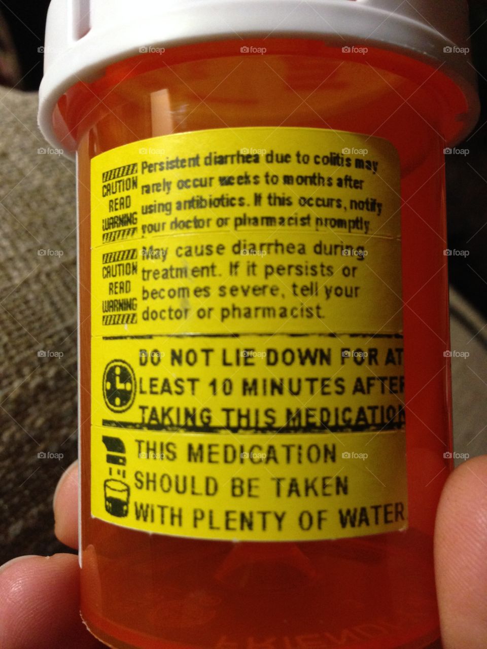 Warning label on antibiotic medication bottle.