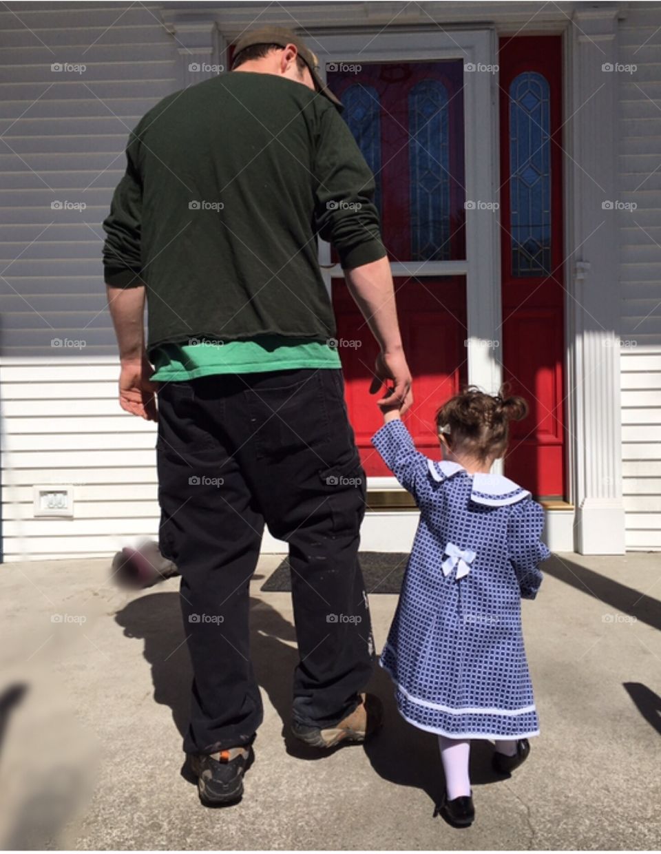 Just a girl and her dad on Easter walking together 