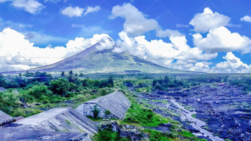mayon volcano one of the eight wonders in the world, the volano has maintained its perfect cone  despite several eruptions. the gulleys can be seen