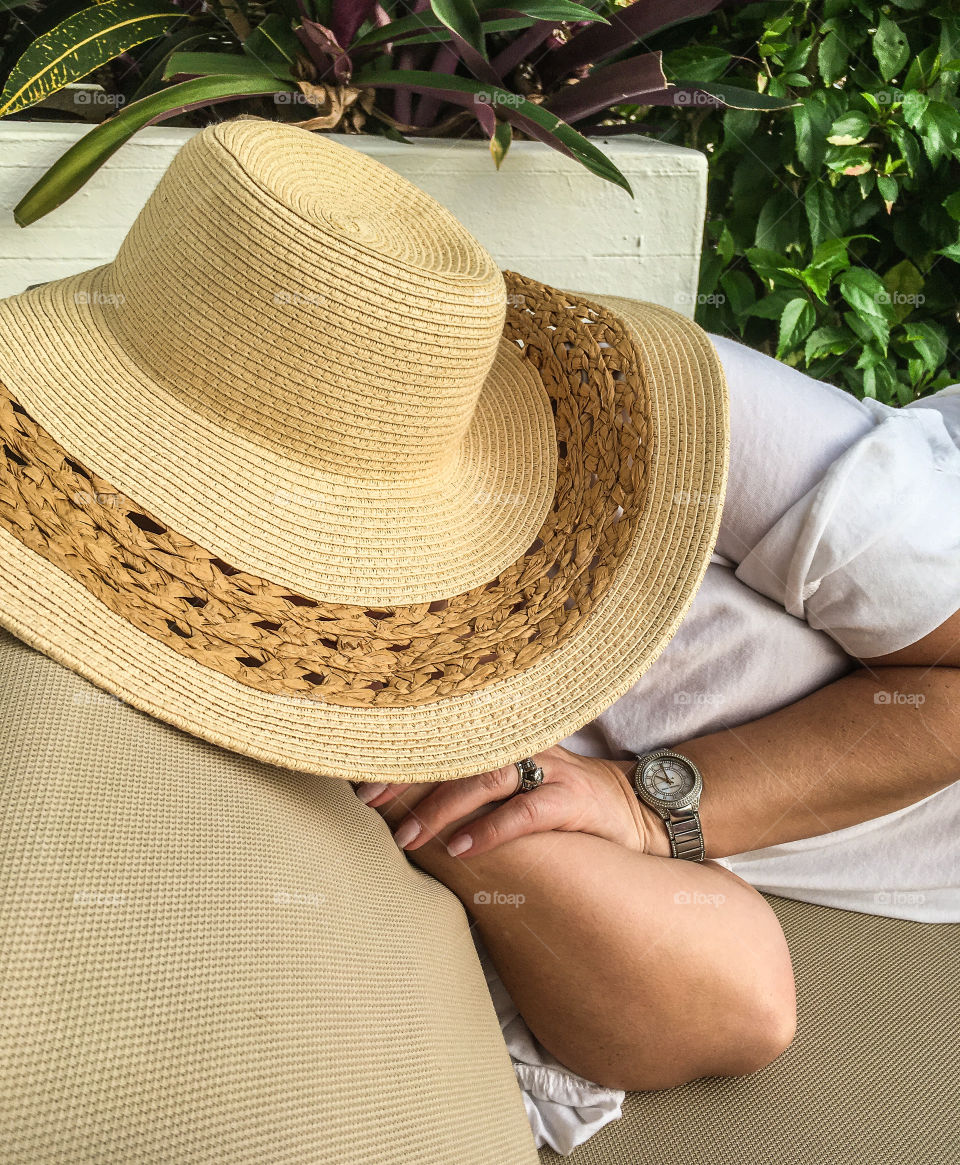 Nap time. After a long day of travel, my friend decided it was time to take a snooze out on the deck by the pool.  