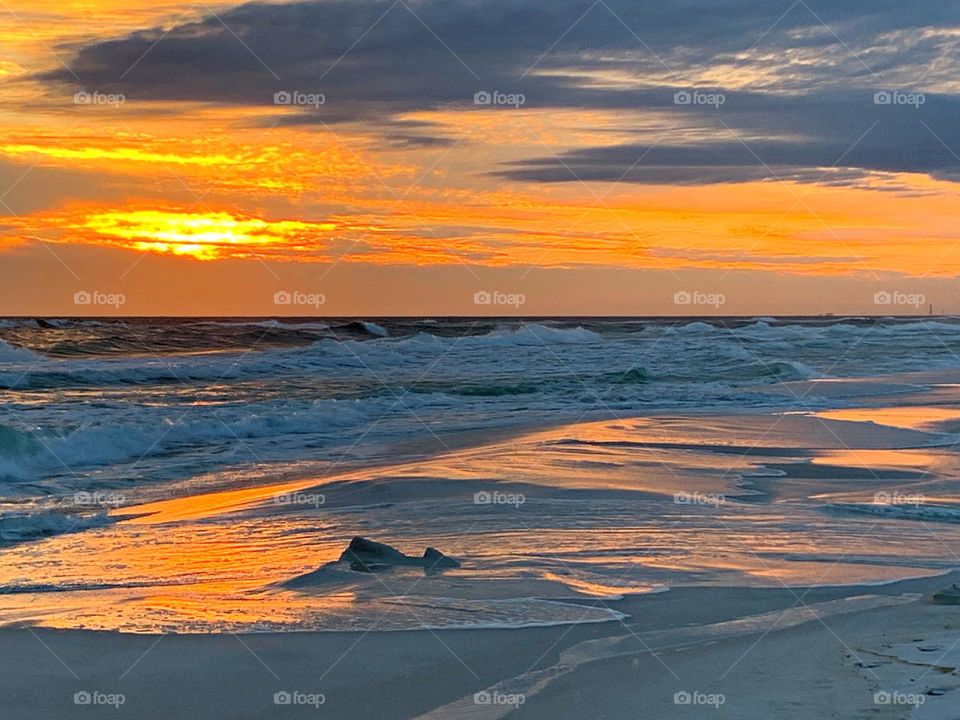 Spectacular sunset over the Gulf of Mexico - Sunset is the most beautiful when it draws to a close and the light is illuminated before into the promises of darkness