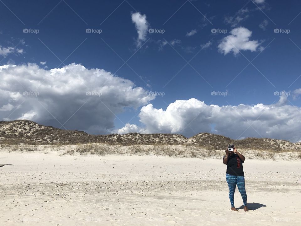 Photographing my sister taking pictures of me. 