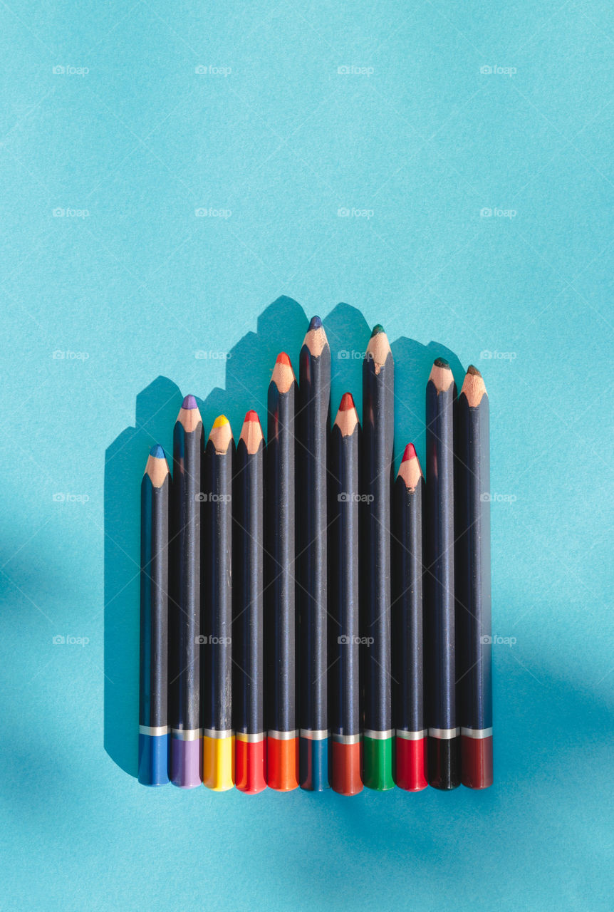 Crayons on blue background