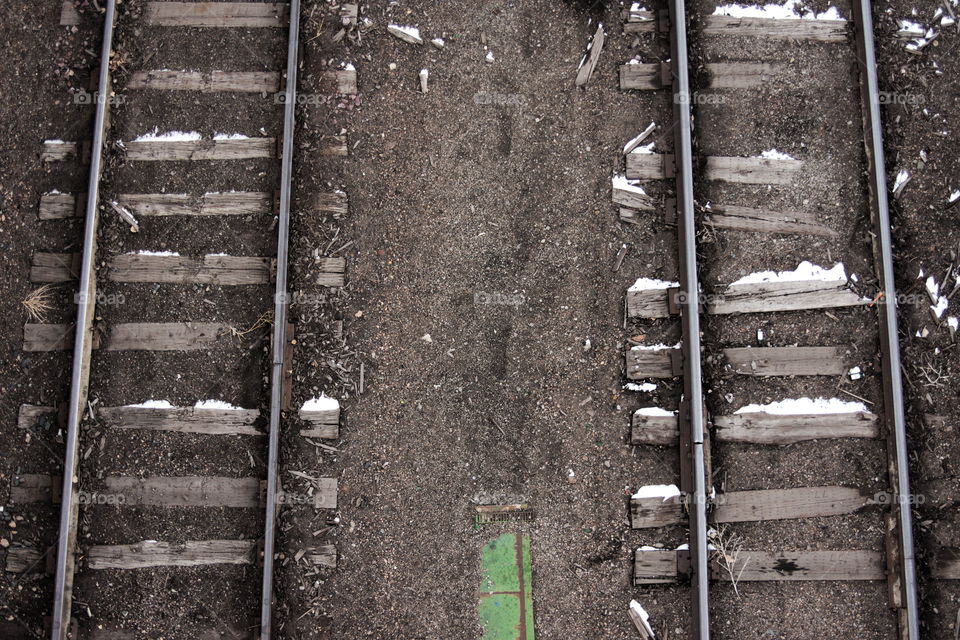 Parallel train tracks in winter.