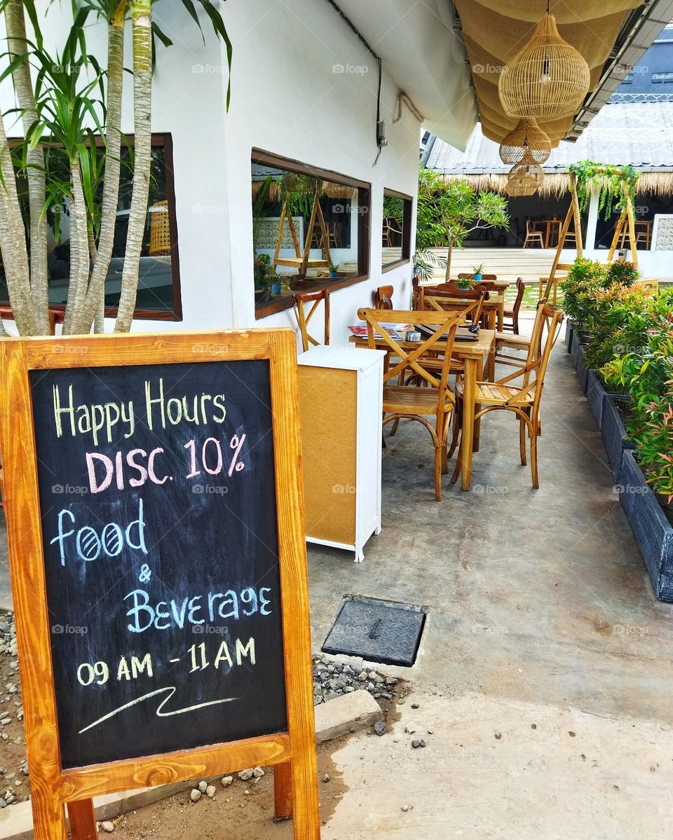 Empty chairs and tables in a cafe