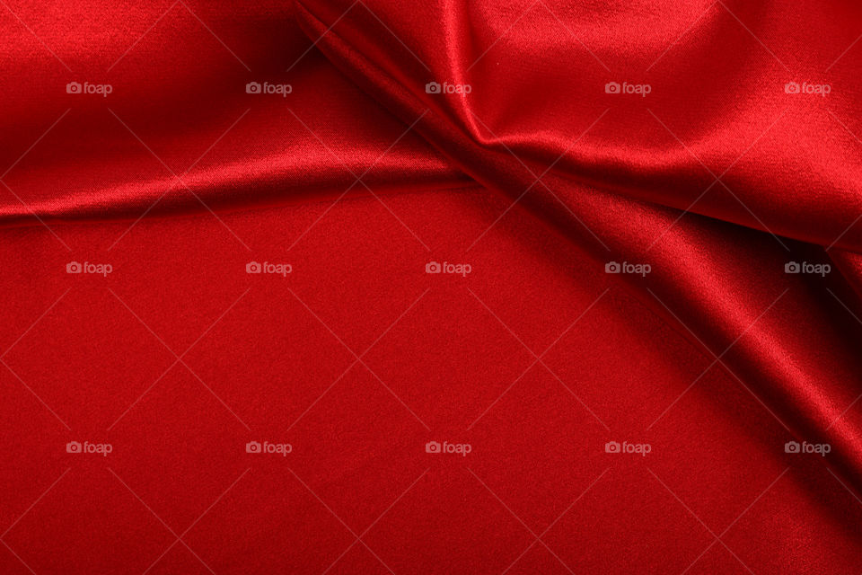 Abstract satin background on red color