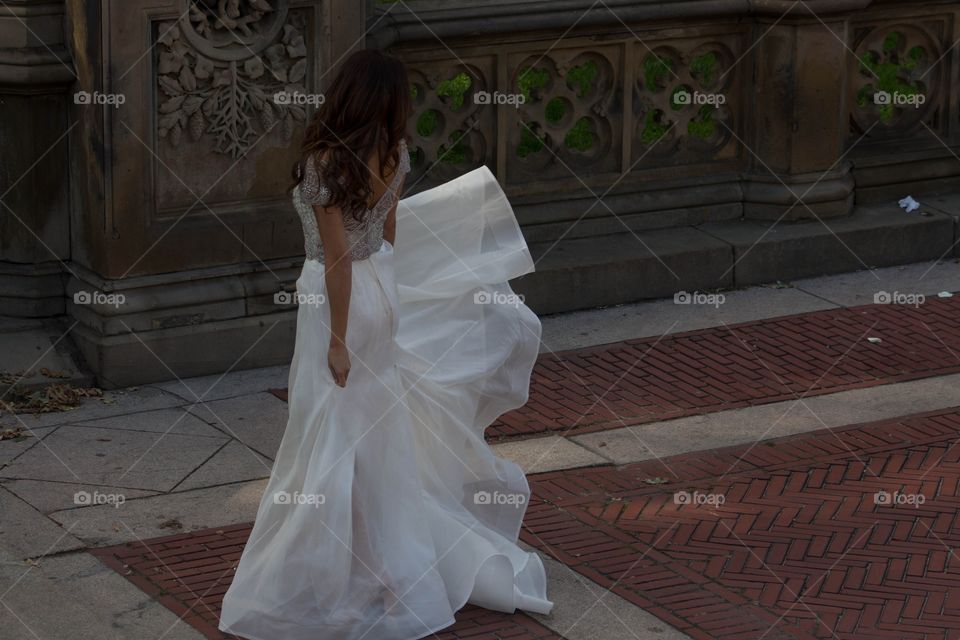 Rear view of girl with bride dress