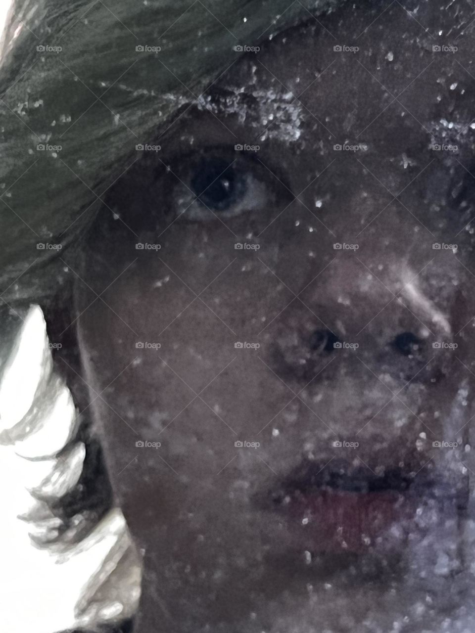 Person’s reflection in old mirror, dramatic expression 