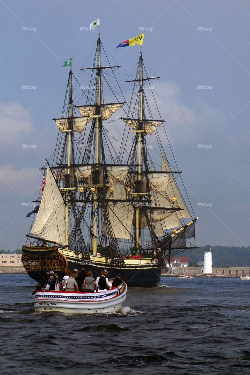 Tall ship Friendship near Portsmouth Harbor Lighthouse