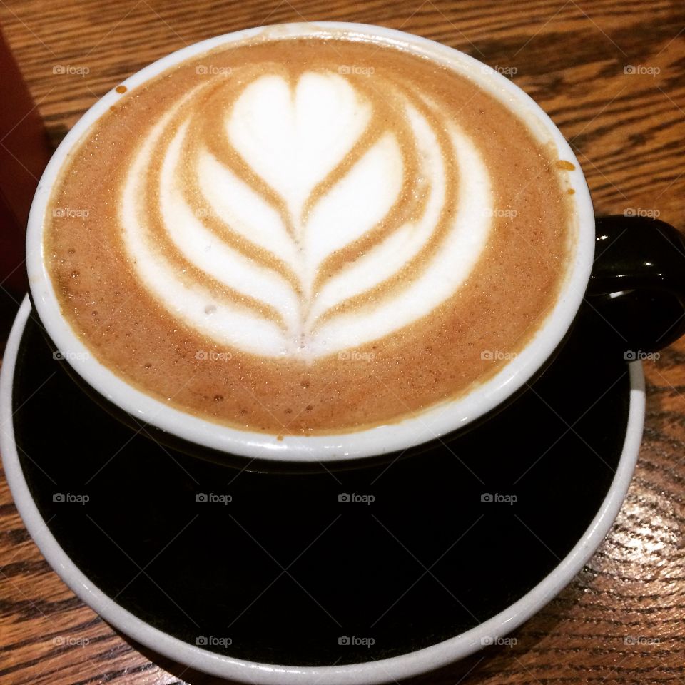 Nutella latte with a floral foam design. 