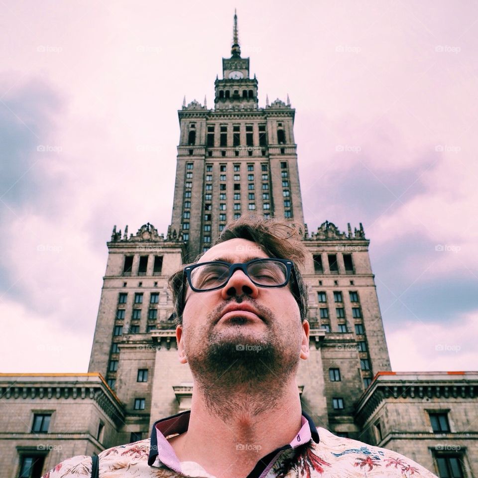 Cultural palace Warsaw. Man standing in front of the cultural palace in Warsaw 