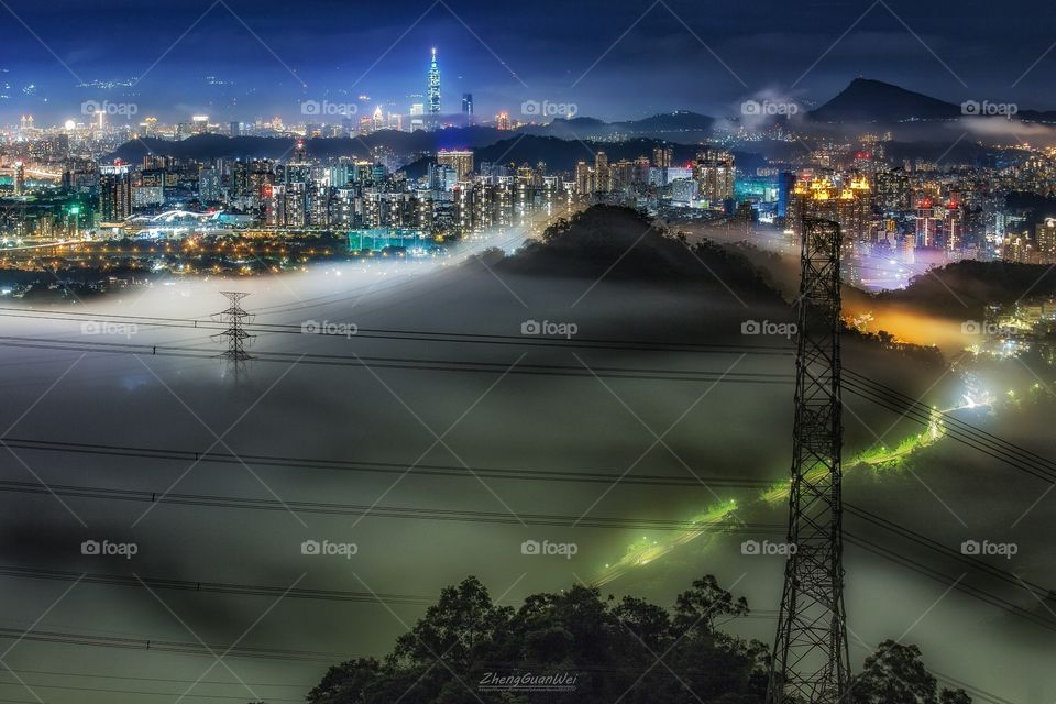 Taiwan cloud sea - urban night view vs mountain colorful fog