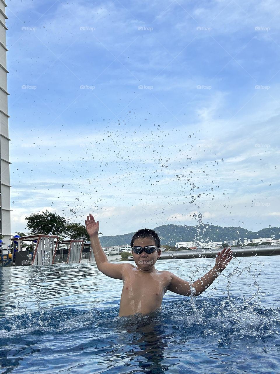 Boy fun in swimming pool 🏊‍♀️