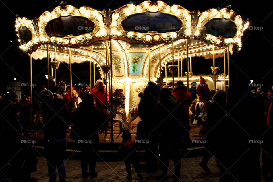 Carousel by night, Christmas market.