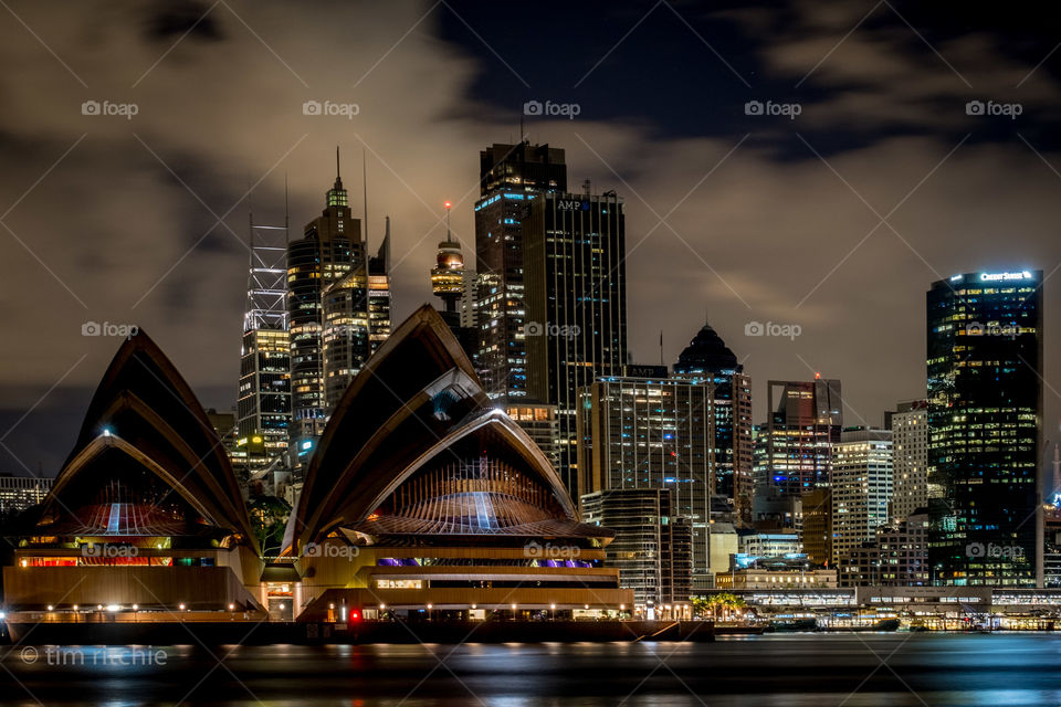 Sydney’s Circular Quay, Opera House and CBD under early morning clouds