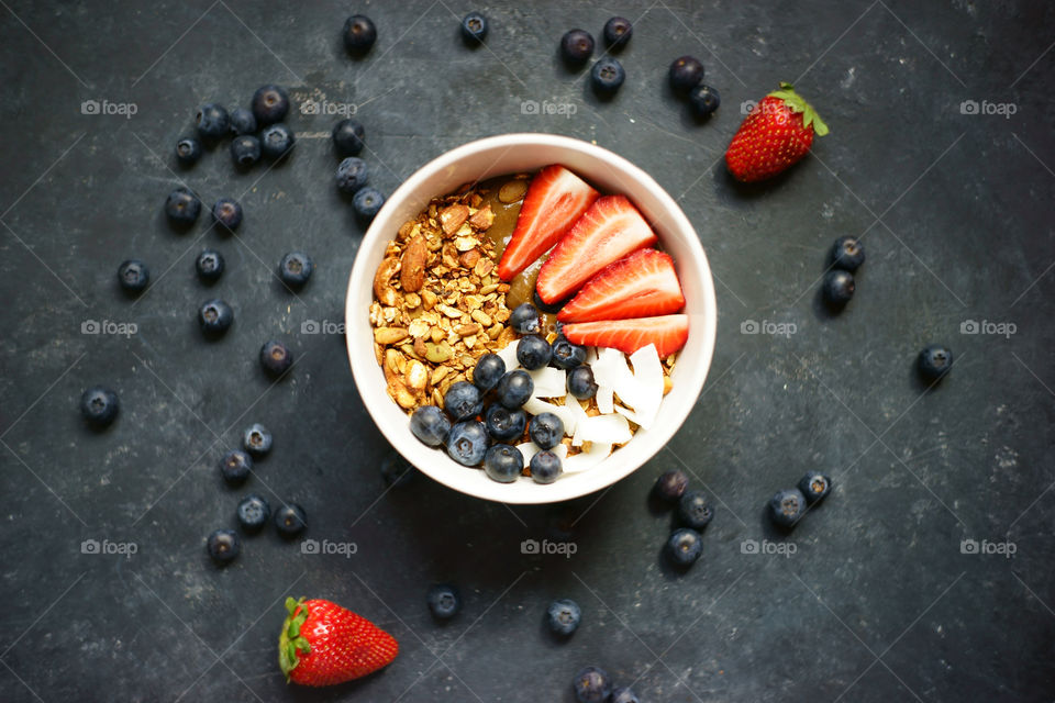 healthy fruit and berries smoothie bowl