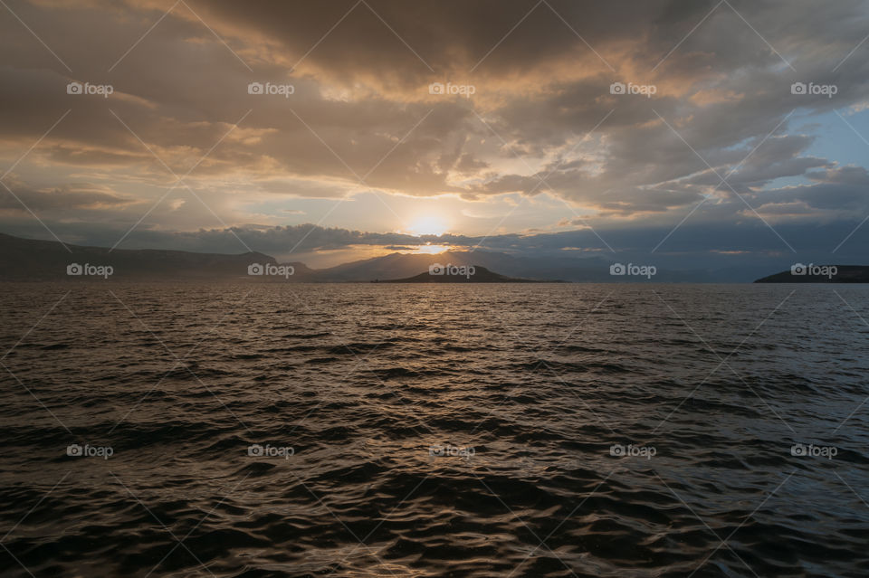 Sunrise over the sea just after rainy night. Adriatic sea. Croatia. Europe.