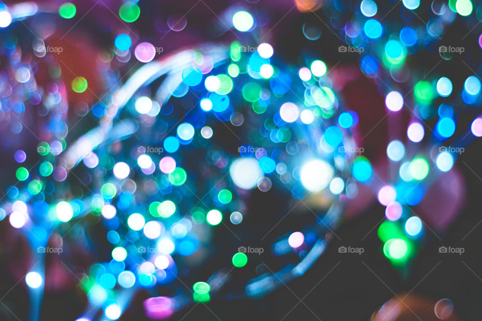 Blurred surface bubbles. Christmas bokeh background. Color unfocussed lights. circular bokeh sparkle glitter lights background. Happy New Year concept