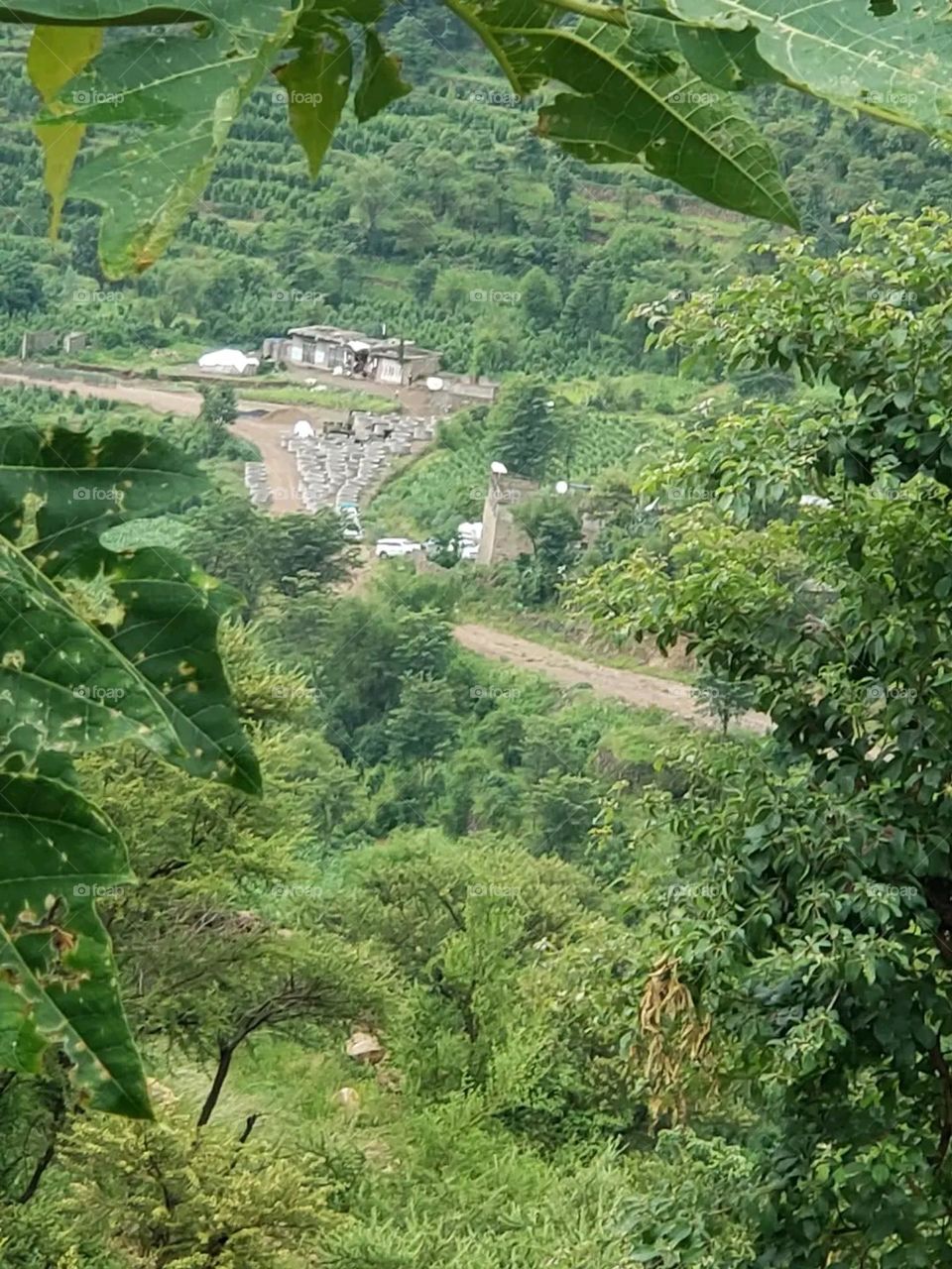 Glory be to God, the magnificent and picturesque view and the natural green trees are a view that is nothing more wonderful than it