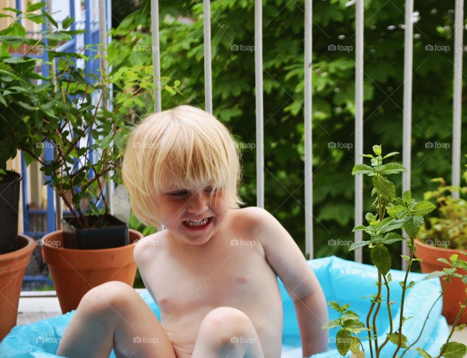 Boy in a pool