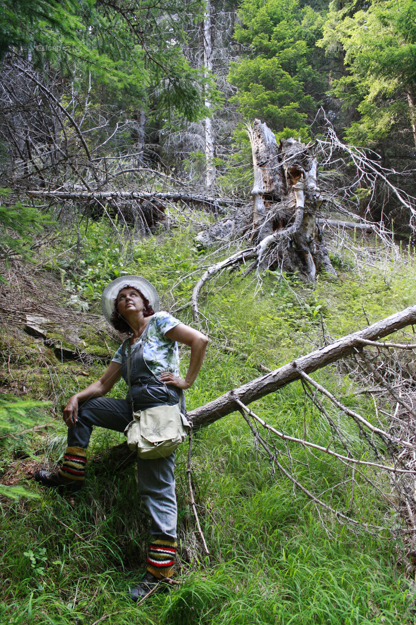 A woman in the mountain woods