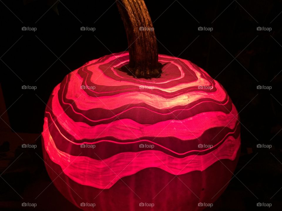Carved pumpkin with candle