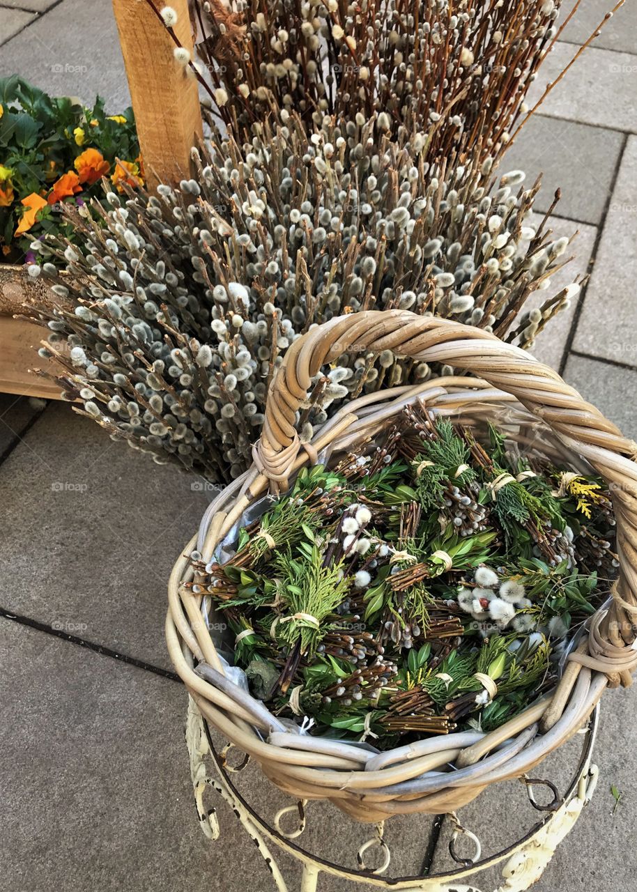 Small pussy willow bouquets in a basket. Easter home decor 