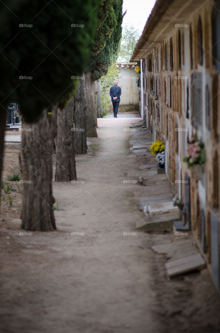 Walking alone at cementery 